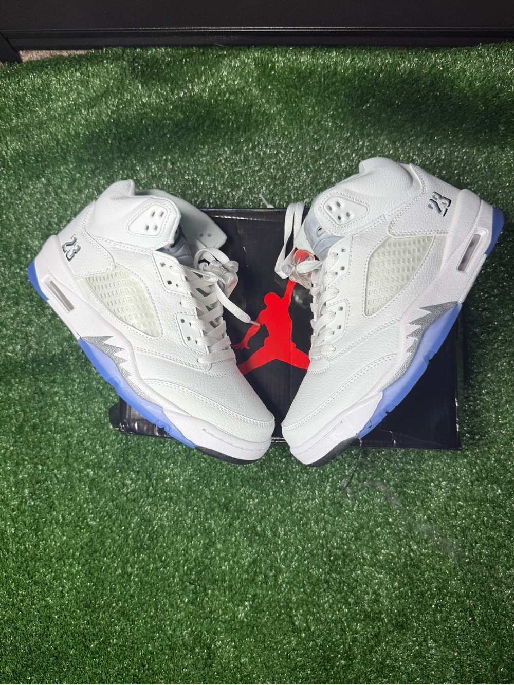 Jordan Men’s White Sneakers with Icy Blue Outsoles